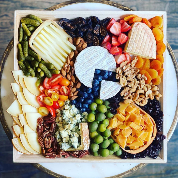 Image is of the signature cheese platter for catering orders.