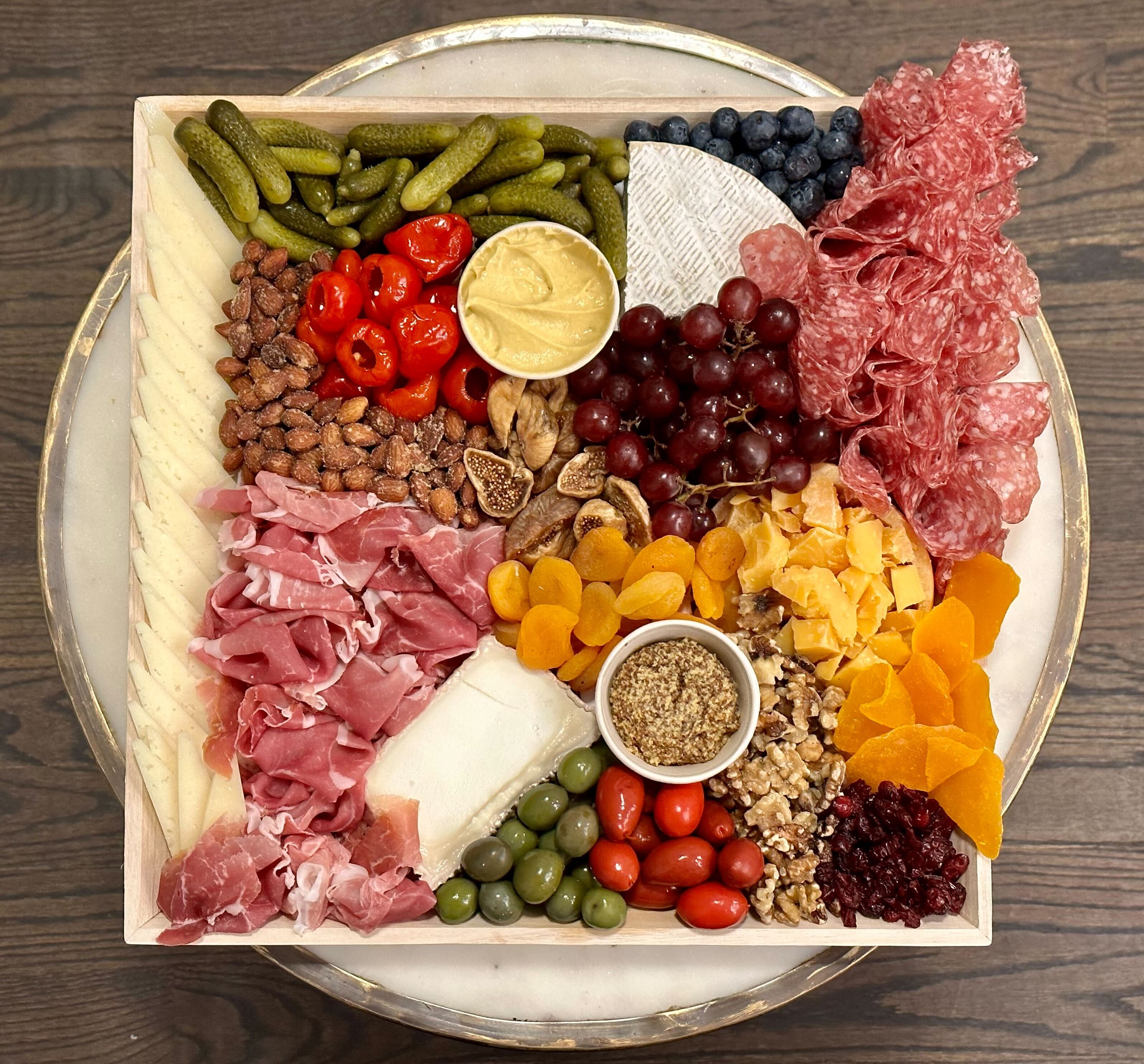 Image is of our Cheese and Charcuterie platter.