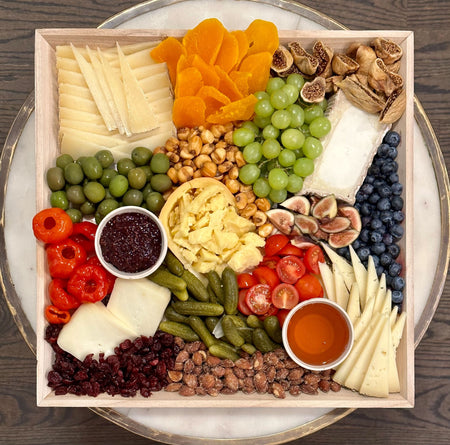 Image of a large international cheese platter.